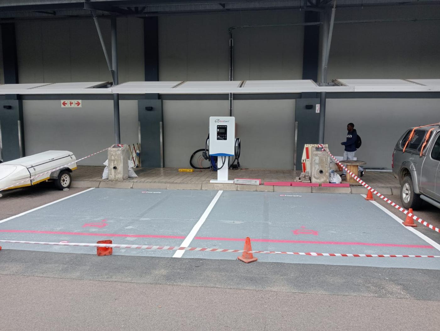 GridCars EV charger installation in progress, marking out a parking bay